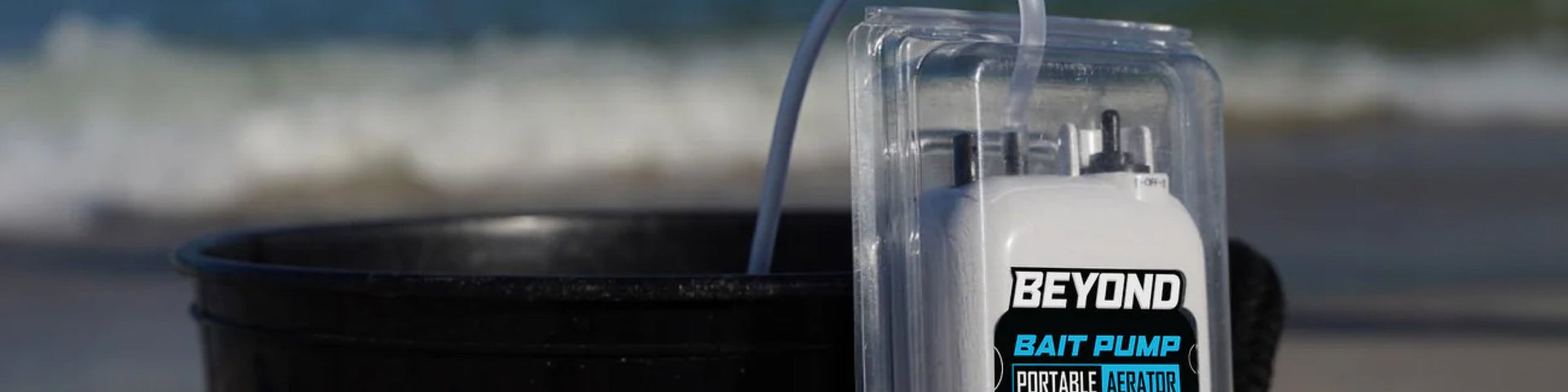 Beyond Braid portable bait pump on a bait bucket